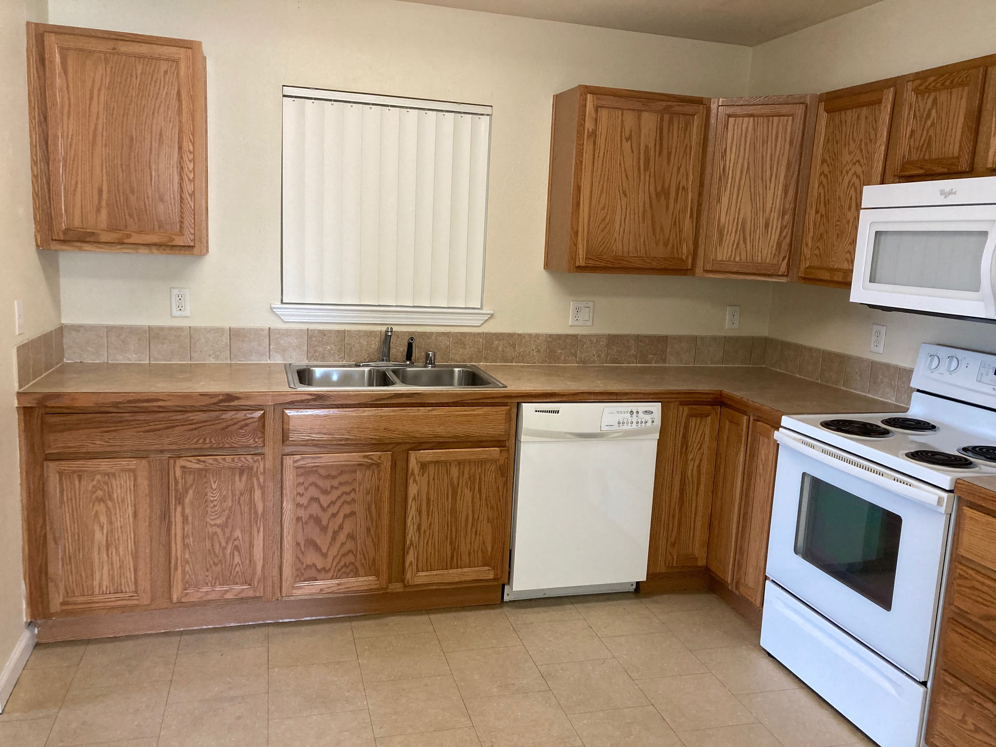 Image of counter space, sink, and amenities